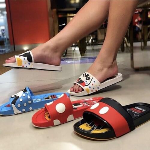 Disneys new Mickey Minnie fashion outer wear fragrant soft beach slippers female thick-soled one-word jelly slippers