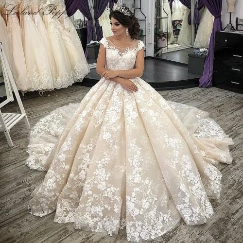 Lceland Poppy Ball Gown Lace Wedding Dresses 2020 Scoop Neck Champagne Sleeveless Floor Length Bridal Gowns Chapel Train
