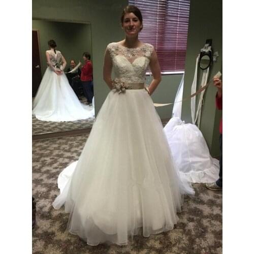 Charming Lace Applique Princess A Line Wedding Dresses Beautiful Scoop Cap Sleeves Flower-Sashes Bridal Gowns Custom Made