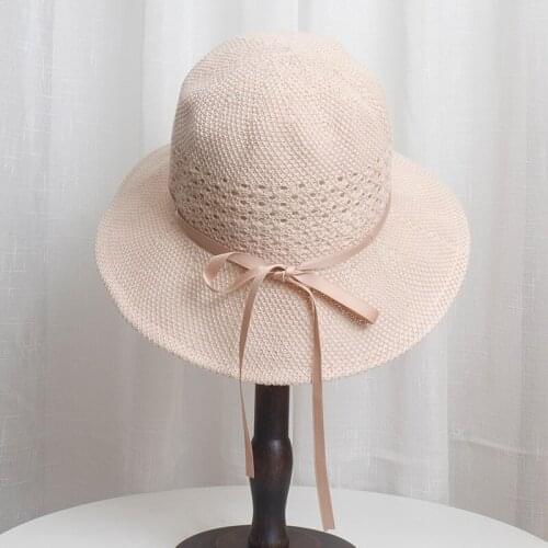 2021 new stitching hat women summer Korean version of the beach hat sunscreen bow fisherman hat