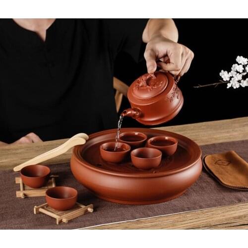Purple clay pot household Kung Fu tea cup set Yixing filter Zhu mud tea double milk pet Jin Chan brave dragon tea WY815