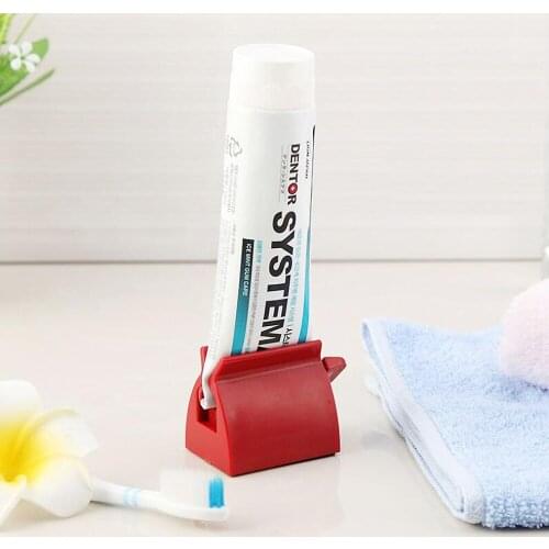 2 Colors Rolling Toothpaste Tube Squeezer Toothpaste Cosmetic Seat Dispenser Holder Stand Dispenser Seat 3