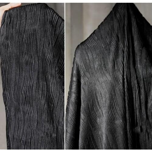 Black striped texture jacquard elastic irregular knitted garment fabric