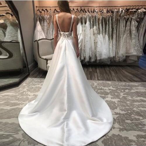 Sexy Deep V-neck Wedding Dresses Spaghetti Straps Backless Elegant A-line Satin Chapel Train White Ivory Bridal Gowns