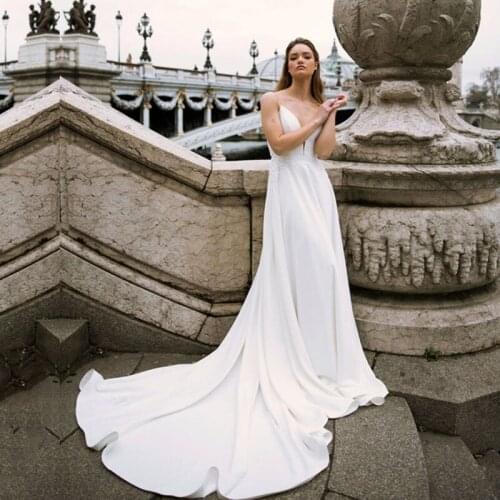 Beach Wedding Gowns 2020 Spaghetti Strap Sexy Bride Dresses Backless Custom Made White Ivory Boho Wedding Dresses