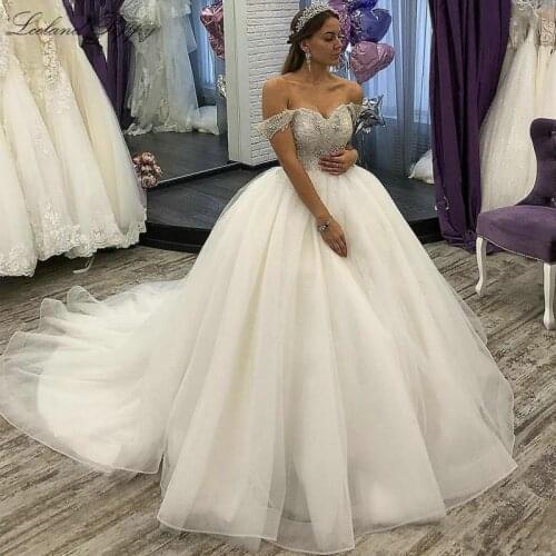 Luxury Ball Gown Tulle Wedding Dress 2020 Off the Shoulder Crystal Beaded Sleeveless Vestido de novia Floor Length Bridal Gowns