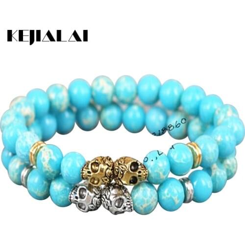 KEJIALAI 2pcs 2018 New Fashion 8mm Beads Bracelet Gold/Silver Color Skull Head Blue Regalite Lava Stone Beads Men Bracelet A0321
