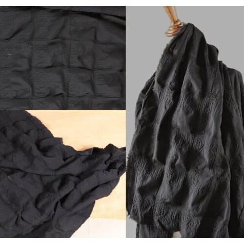 Three-dimensional texture black shrinking checkered special laser square pleated cloth fabric
