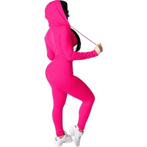 European and American fall new casual sexy womens wear cap long sleeve top sports tight trousers two suit