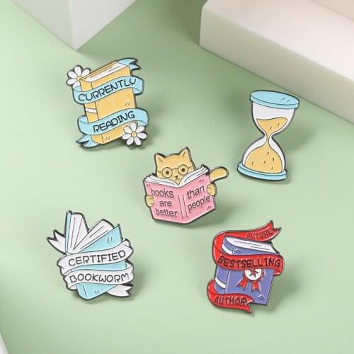 Cartoon Book Enamel Pins Yellow Blue Cat HourglassBrooches Custom Badge Decoration Backpack Caps Gift for Reader Writer Jewelry