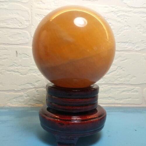 1pcs 8CM Beautiful large natural orange calcite stone crystal ball with healing+Rotate the base