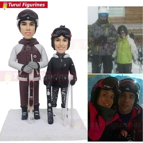 Ski scene figurine for two character sketch and sculpture design custom sculpted facial from photos alpine skiing sport sculptur