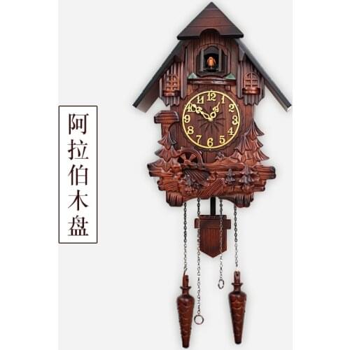 Solid wood engraving cuckoo wall clock childrens room living room music whole point newspaper clock swing creative