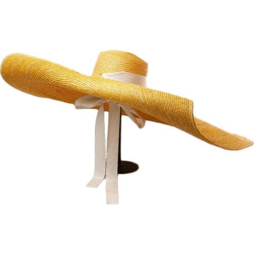 Designer Luxury Catwalk Hats For Women Wide Brim Oversized Beach Hat For Women Yellow Natural Straw Hat Handmade UV Protection