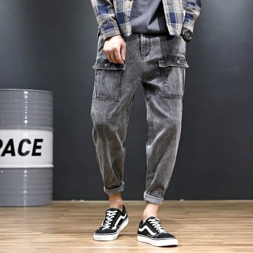 Casual trousers overalls jeans mens loose feet high elastic large size pants plus fat increase Harlan was thin