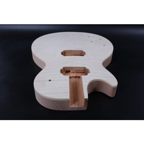 One left hand unfinished body mahogany made and maple top