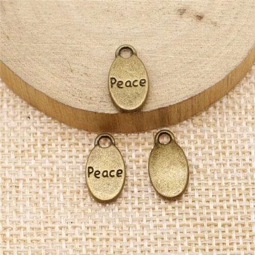 Free shipping 46pcs 15x8mm antique bronze peace charms diy retro jewelry fit Earring keychain hair card pendant accessories