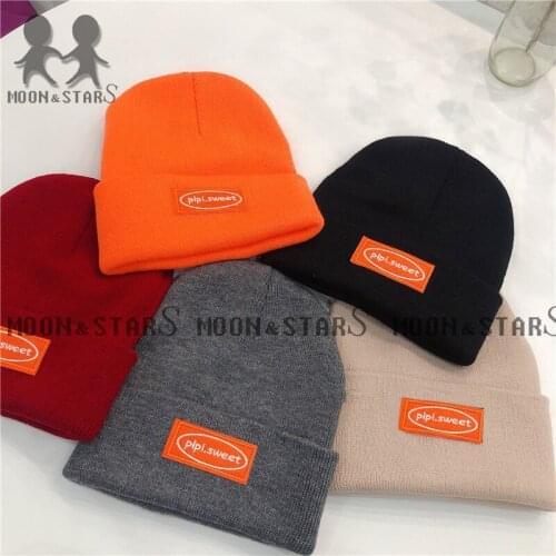 New winter mens and womens labeling hedging hats biking ear protection warm knitted woolen hat trend wild hip-hop hat