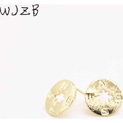 Fashion compass stud earrings.Pop compass ear nails.A for the beautiful ladies