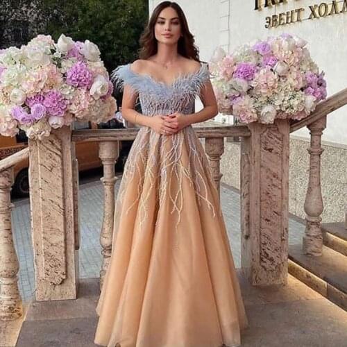 Champagne prom dresses 2021 beaded feather crystal a line tulle v neck floor length evening dresses gowns vestidos de fiesta