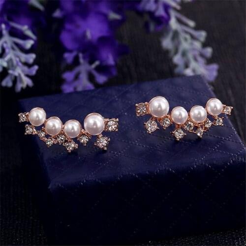 XIAO YOUNG Stud Earrings