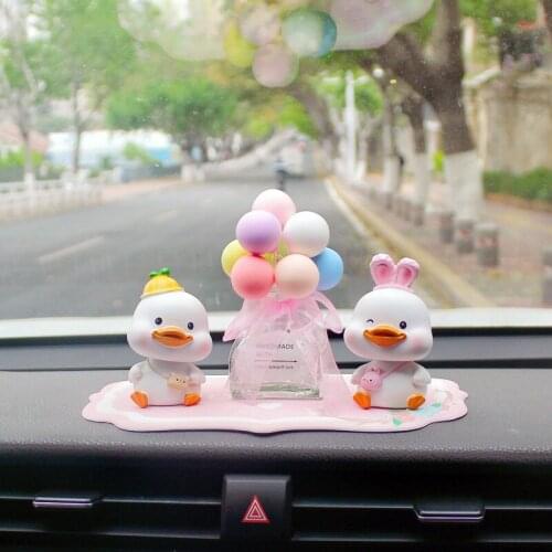New High-End Cartoon Shaking Head Little Yellow Duck Female Car Gift Car Interior Decoration Ornament