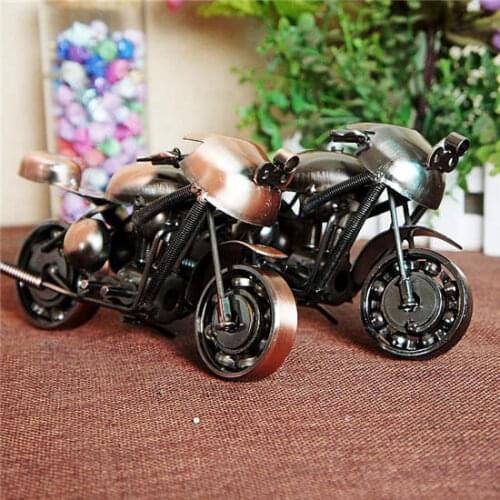 Hand-made metal metal ring iron decoration process beautiful arc with motorcycle metal ring statue placed Easter