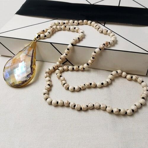 WT-N1096 Wholesale Trendy Titanium Angel Crystal Pendant With White Beads Water Drop Shape Necklace For Women Jewelry