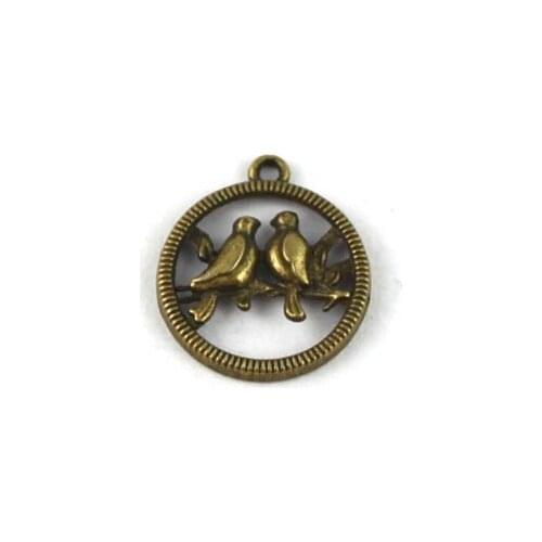 FREE SHIPPING 600PCS Antiqued bronze bird round Charms A13544B