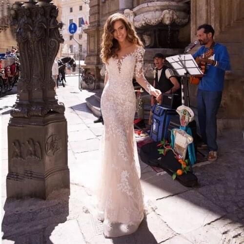 Gorgeous Long Sleeve Mermaid Wedding Dresses 2021 Sheer Scoop Neck Lace Appliques Button Back Tulle Bridal Gown Sweep Train