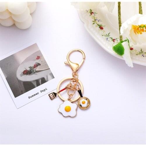 Korean Cartoon Fried Egg Keychain Student Ins Cute Pendant Creative Gift Airpods Earphone Set Pendant