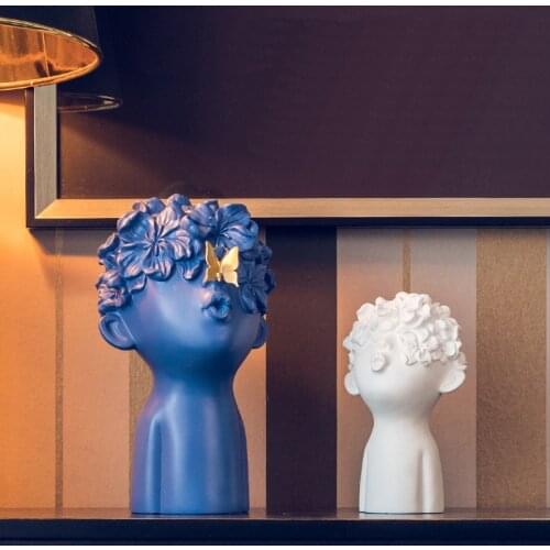 Fashion boy blowing butterfly modeling resin craft sculpture Unique artistic figures sculpture home decoration