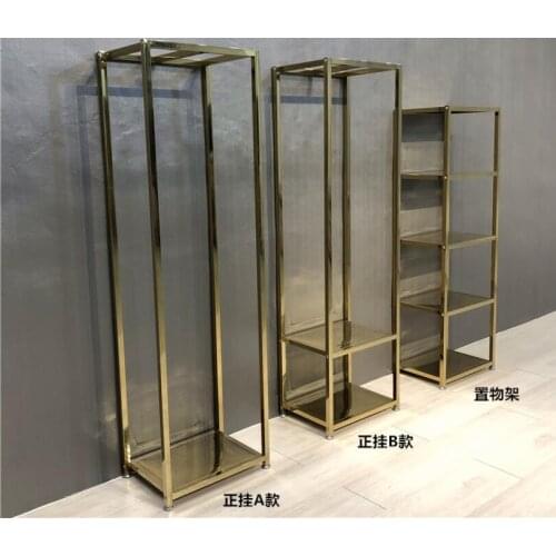 Clothing store gold shelf bag display rack birdcage is hanging womens wedding dress floor hanger