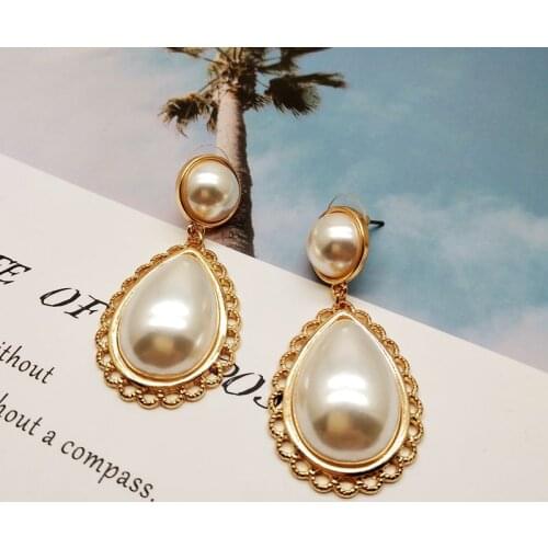 Role ofing is tasted in Europe and the earrings ear E10 joker temperament socialite pearl 56 exaggerated fashion