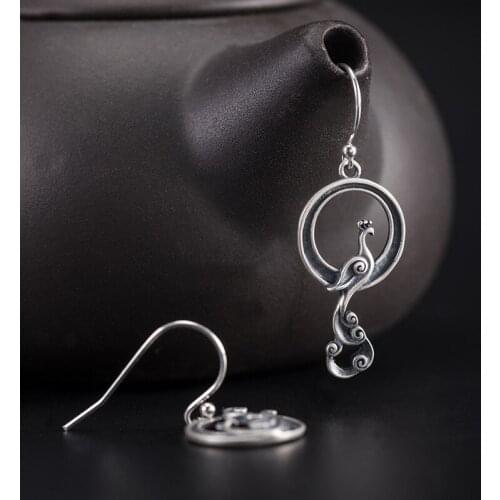 JUXO Dangle Earrings