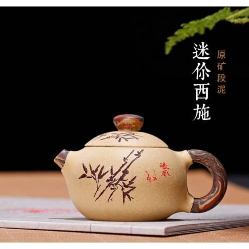 Undressed ore section of mini apple in pot of warping clay mud process sketch with furnishing articles pocket tea set