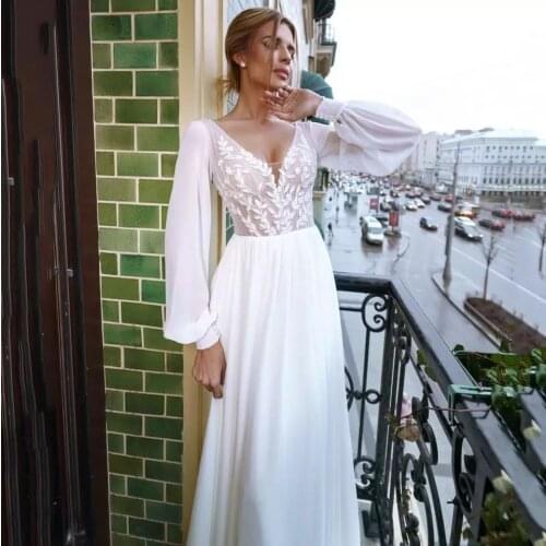 Charming Sweep Train Long Sleeve Wedding Dresses 2021 A-Line Sexy V-Neck Appliques Elegant Chiffon Bridal Gown Backless