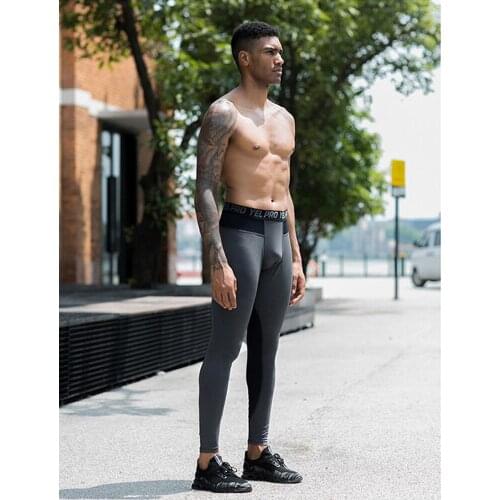 Mens Pro Tights Outdoor Fitness Apparel Quick-Drying Training Pants High Elasticity Net Breathable Sports Trousers Activewear