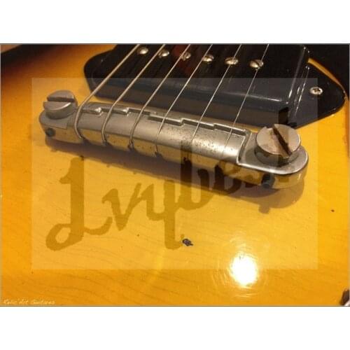 Customized body and headstock shape electric guitar,aged effect body and headstock,rosewood fingerboard,dots inlay,our tail way