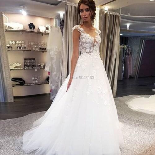 Unique Tulle Lace 3D Flowers Wedding Dresses Ivory Appliques Vestido De Noiva Sheer Scoop Neckline Cap Sleeves Bridal Gowns