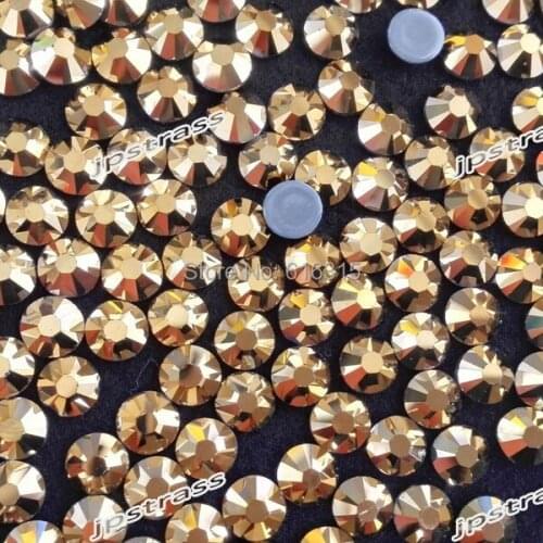 Free shippping !!! high levels shiny of gold color ss30 with 288 pcs each pack ;golden crystal for children dancing wear