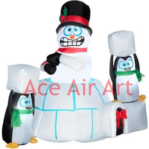 Funny froze inflatable snowman combination including penguin and snow fort for Christmas