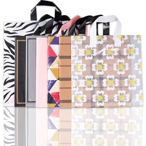 50Pcs/Lot Festival Gift Plastic Bag Clothes Shopping Bags with Handles Plastic Portable Bag Large Gift Bags 4 Sizes