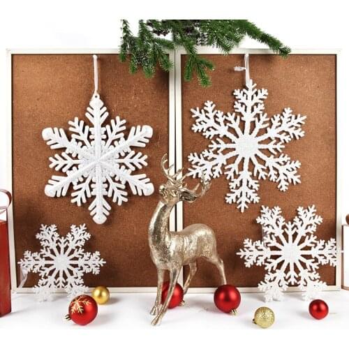 Christmas decorations white glitter large snowflakes ornaments Christmas tree window scene arrangement snowflake pendants