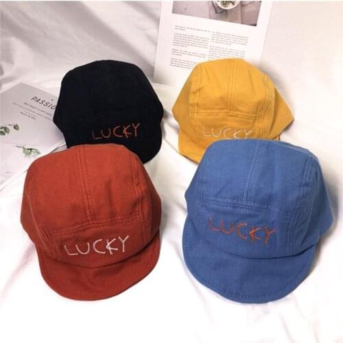 Childrens soft rock flat peaked cap men and women baby retro short brim baseball cap English embroidery cowboy hat