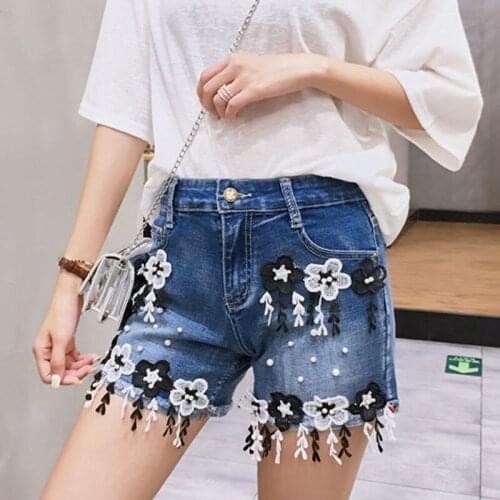 2019 new large womens new high waist thin nail bead lace wide leg pants loose elastic denim shorts