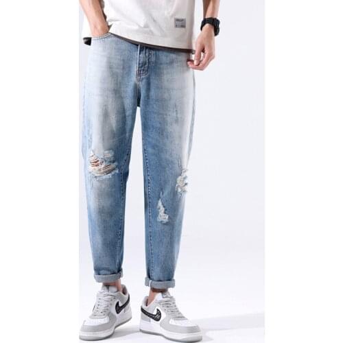 Distressed Jeans Men Denim Pants Light Blue Loose Fit Ripped Moto Biker Jeans Man Hip Hop High Street Knee Holes Punk Style