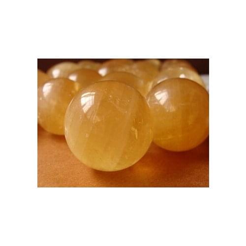 Natural orange yellow calcite ball wheel sun wheel ball 38mm --45MM
