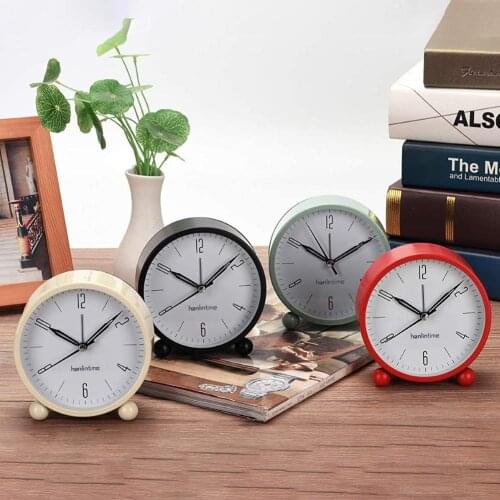 4inch Metal Round Alarm Clock Quiet Desktop Bedroom Battery Operated Timepiece Round design is simple and elegant. in bedroom