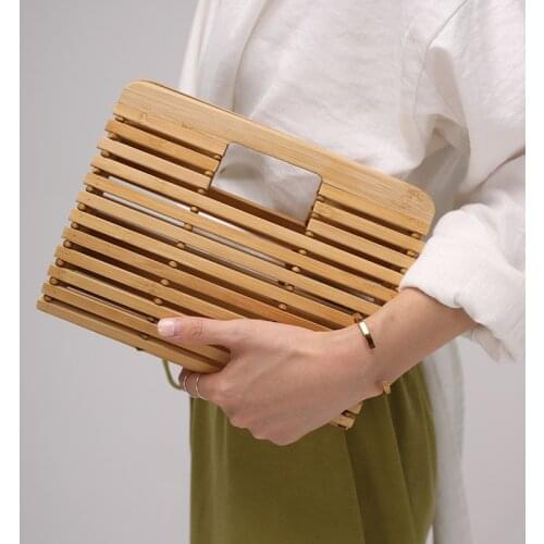 Summer 2020 Bohemian style hand-made bamboo wood bar woven square beach bag hollow carving handbag womens bamboo basket bag